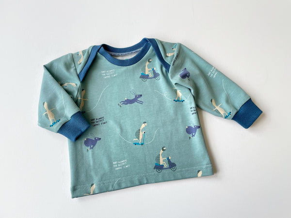 Groen baby t-shirt met schildpadden en hazen