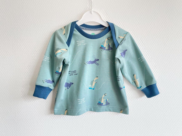 Groen baby t-shirt met schildpadden en hazen